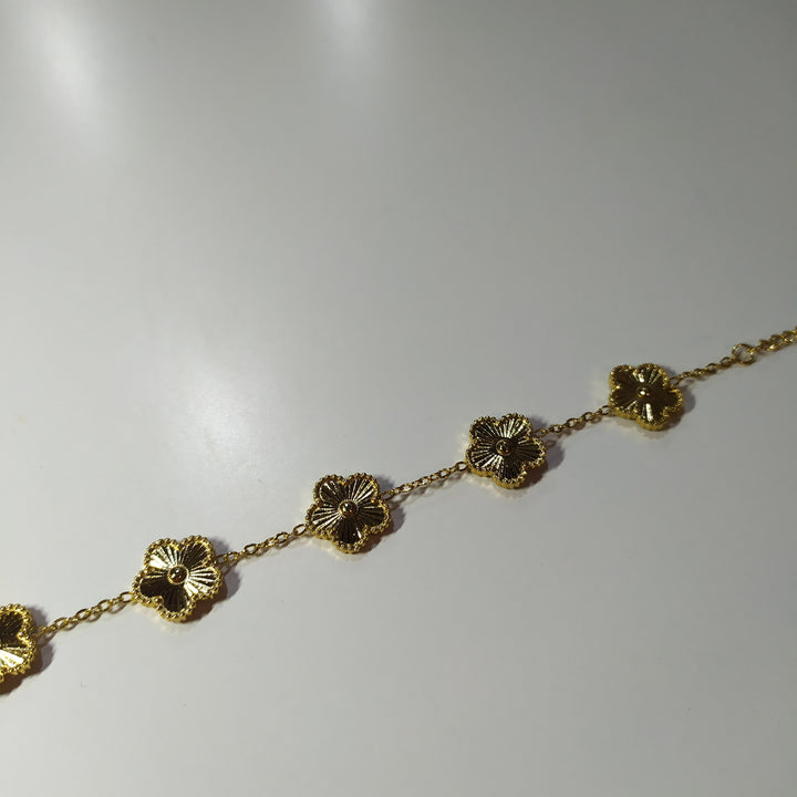 Pulsera trebol de cinco hojas oro