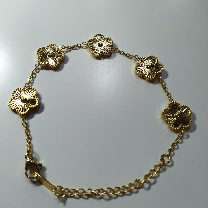 Pulsera trebol de cinco hojas oro