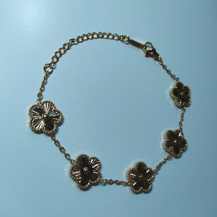 Pulsera trebol de cinco hojas oro