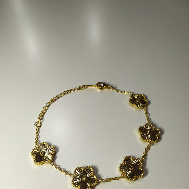 Pulsera trebol de cinco hojas oro
