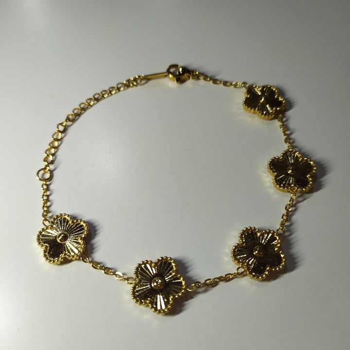 Pulsera trebol de cinco hojas oro