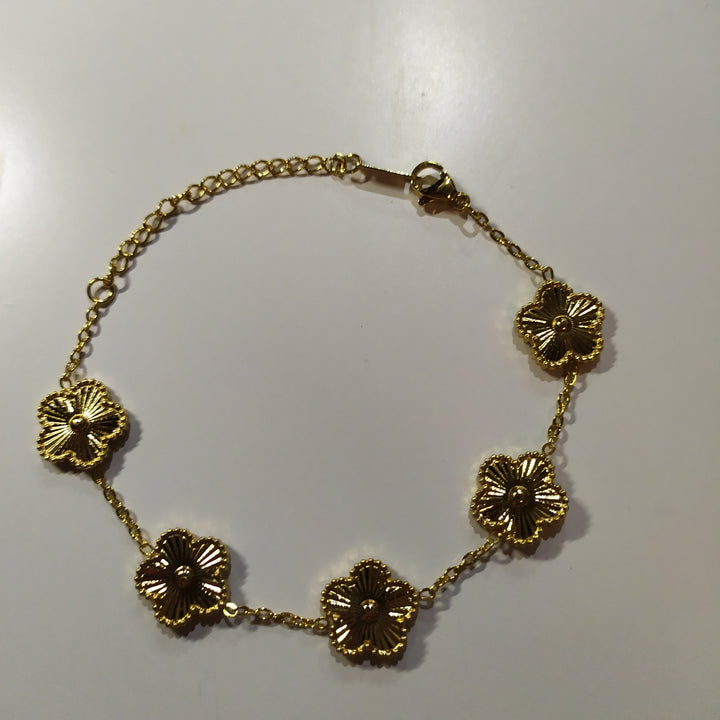 Pulsera trebol de cinco hojas oro
