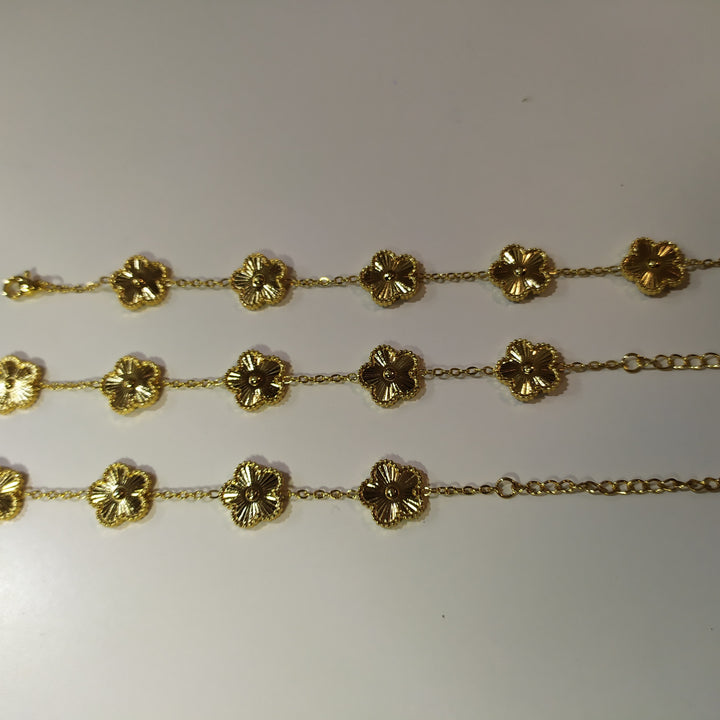 Pulsera trebol de cinco hojas oro