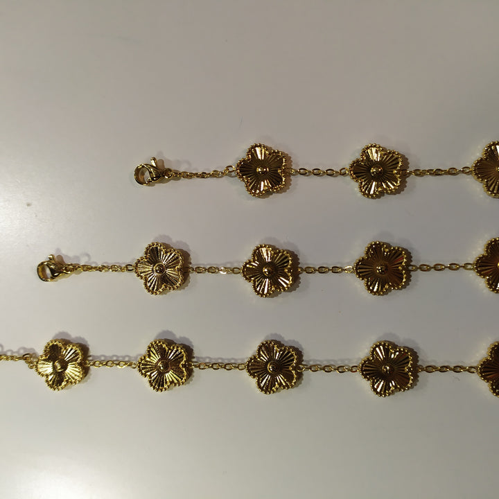 Pulsera trebol de cinco hojas oro