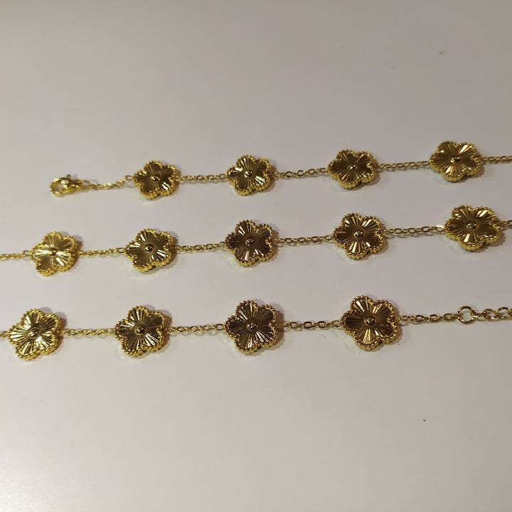 Pulsera trebol de cinco hojas oro